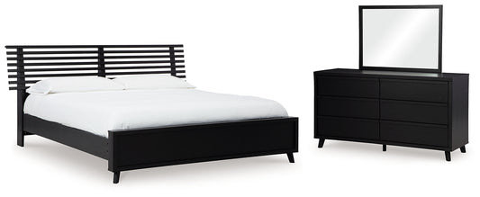 Danziar Panel Bed With Mirrored Dresser