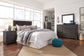 Brinxton /California King Panel Headboard Bed With Mirrored Dresser, Chest And Nightstand