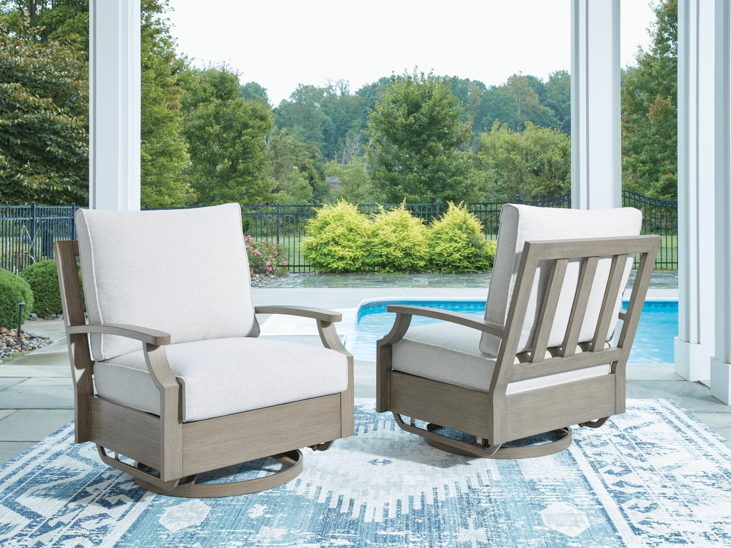 Ashley Express - Sillón giratorio y deslizante Rainier Ranch con cojín