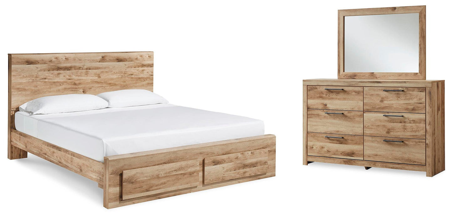 Cama Hyanna con almacenaje en el panel, cómoda y espejo