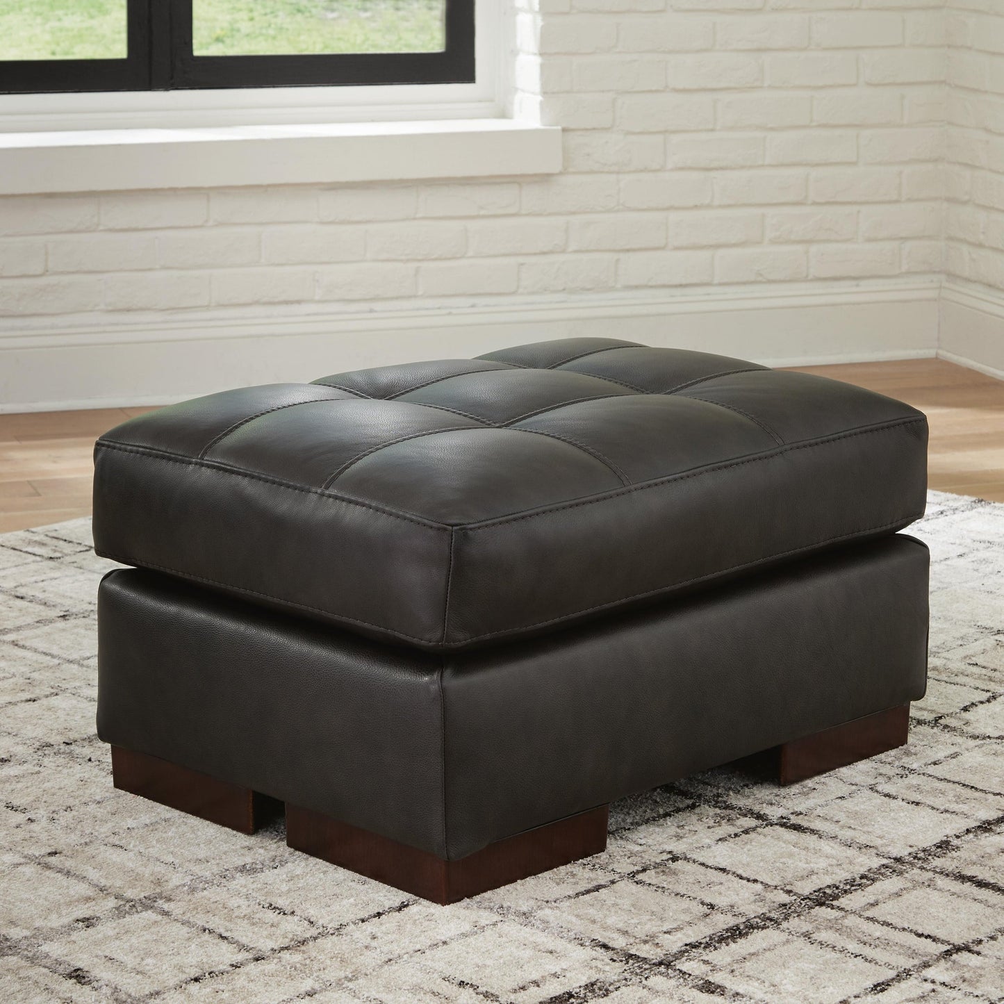 Sillón y otomana Luigi