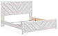 Cama de panel Cayboni con cómoda con espejo