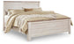 Cama con paneles Willowton con cómoda con espejo y mesita de noche