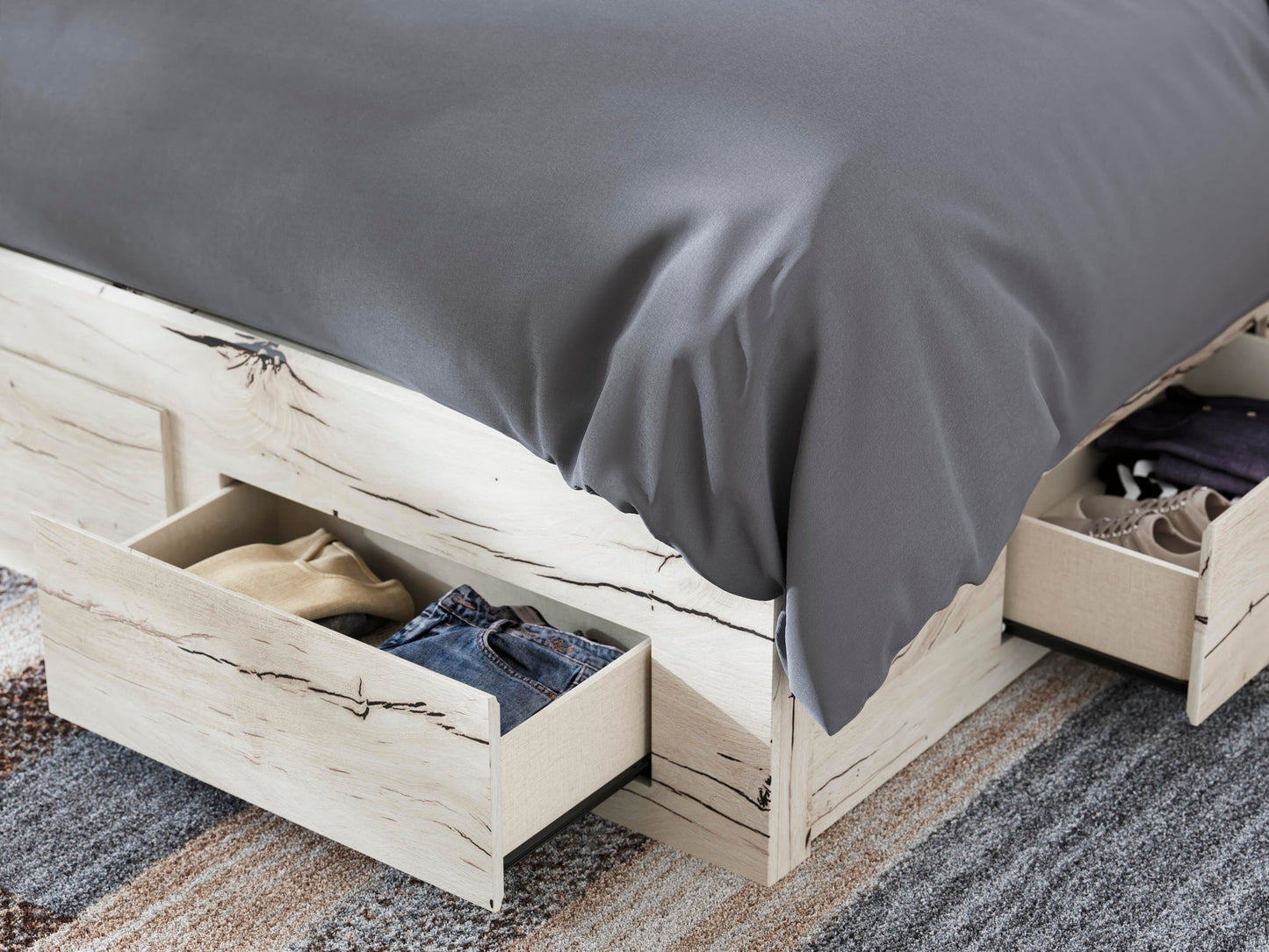 Cama con cabecero Lawroy, cómoda y espejo