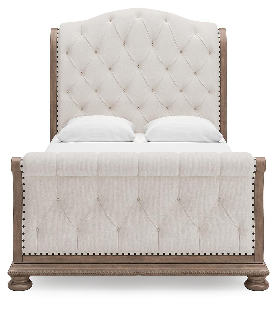Ardenfield  Upholstered Sleigh Bed, Dresser, Mirror, Chest And Nightstand