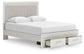 Cama con plataforma tapizada con paneles, cómoda y espejo Zuraleus